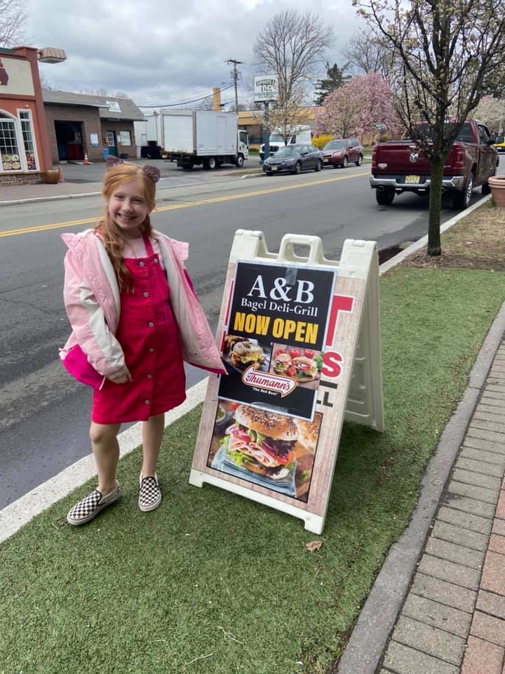 Emma at A & B bagles randolph buying gift cards