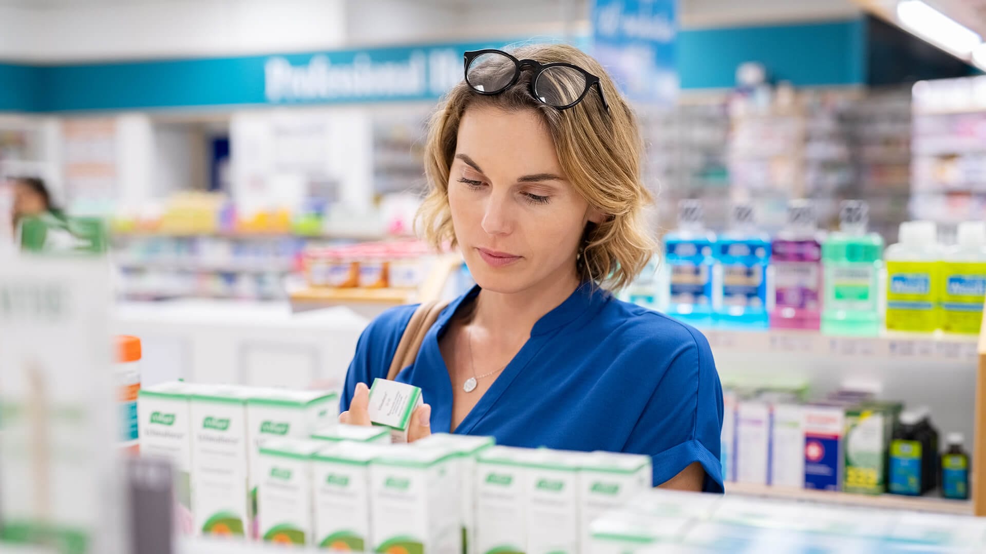 Ensure Your Product Packaging Stands Out woman reading packaging